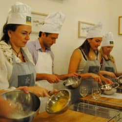 cultura italiana students cooking during a italian language course and cooking